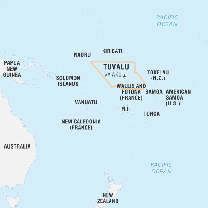 A map of the Pacific Ocean region highlighting Tuvalu, with its capital Vaiaku marked. Neighboring countries and territories include Kiribati to the north, Nauru to the northwest, Tokelau (New Zealand territory) to the northeast, Samoa and American Samoa (U.S. territory) to the east, Tonga to the southeast, Fiji to the south, Wallis and Futuna (France) to the southwest, and Vanuatu, Solomon Islands, Papua New Guinea, New Caledonia (France), Australia, and New Zealand further west and south. The map shows Tuvalu outlined in orange.