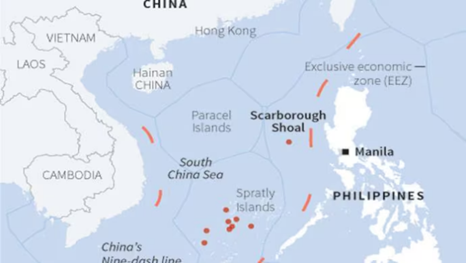Map of the South China Sea showing China’s nine-dash line, the Philippines’ EEZ, and disputed areas including the Paracel, Spratly, and Scarborough Shoal.