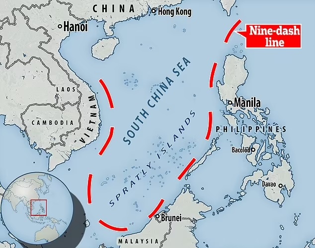 A map of the South China Sea with a detailed focus on surrounding regions including China, Vietnam, the Philippines, Malaysia, and Cambodia. A red dashed line labeled "Nine-dash line" is shown encircling the Spratly Islands, indicating territorial claims. An inset of the world map highlights the region in red.