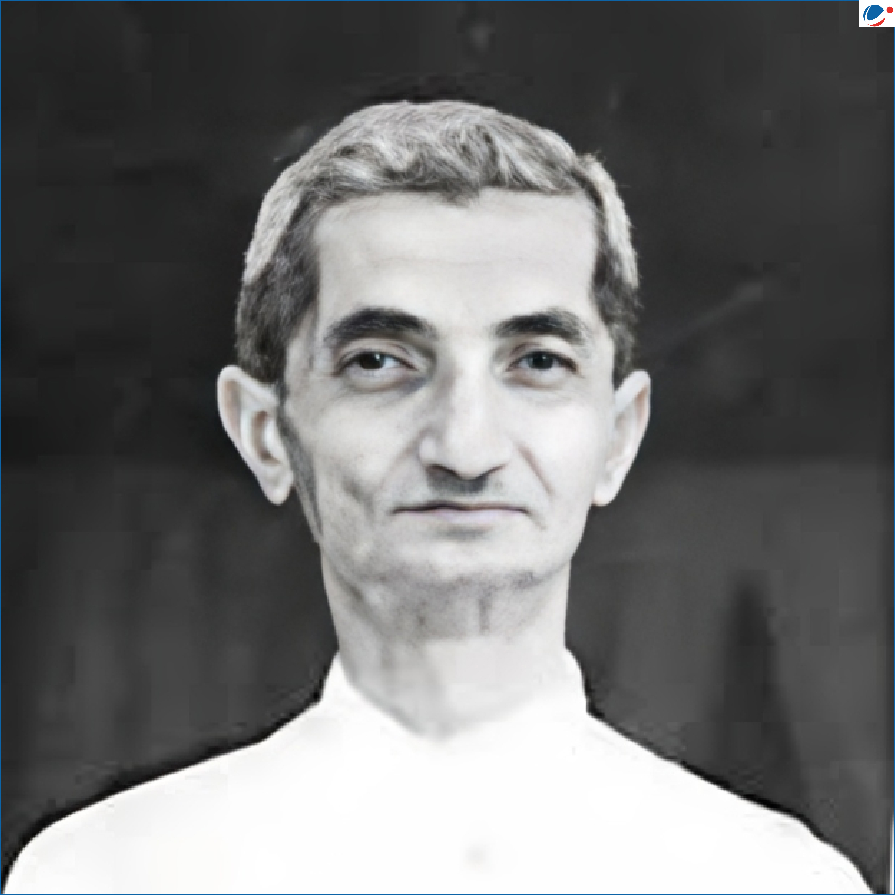 A black-and-white portrait of Vaikunthbhai Mehta, featuring him with short, neatly combed hair and a calm expression, dressed in a light-colored high-collared shirt against a dark background.